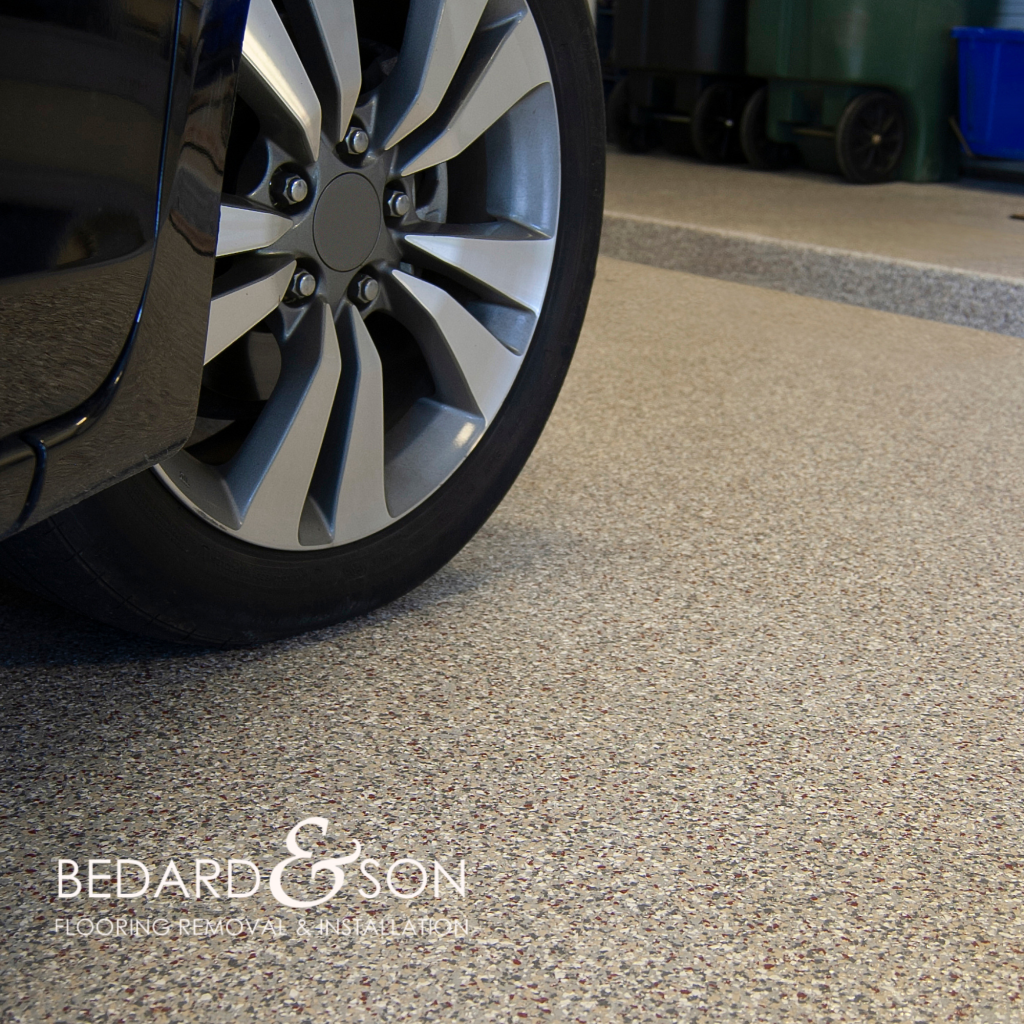 car on an epoxy flooring garage in west palm beach, fl